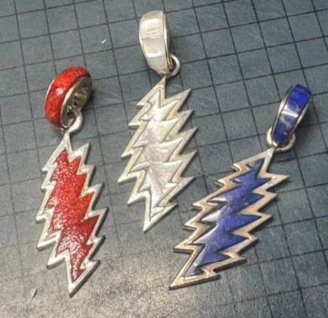 13 Point Bolt Pendants – Apple Coral, Mother of Pearl, and Lapis